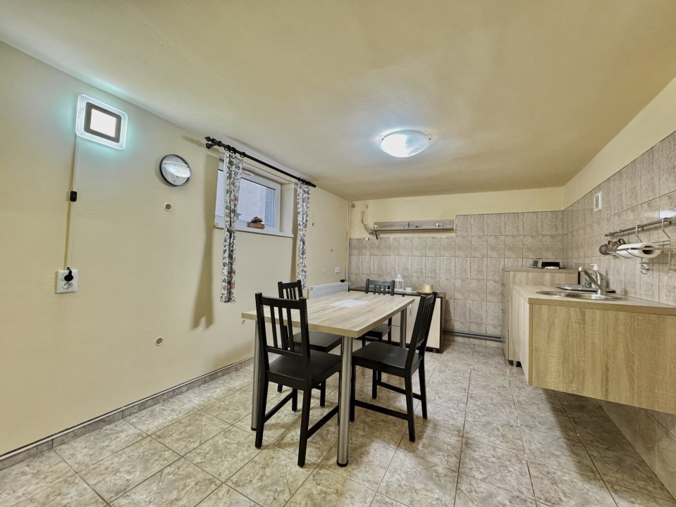 Apartament la casa – 4 camere + demisol util + curte și garaj Sibiu
