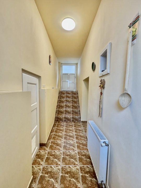 Apartament la casa – 4 camere + demisol util + curte și garaj Sibiu
