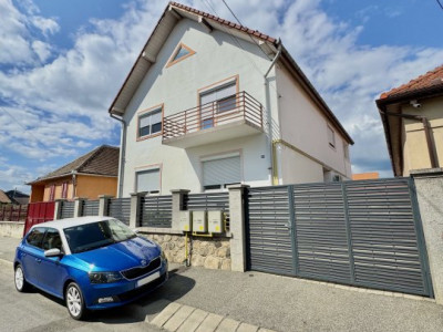 Apartament la casa – 4 camere + demisol util + curte și garaj Sibiu