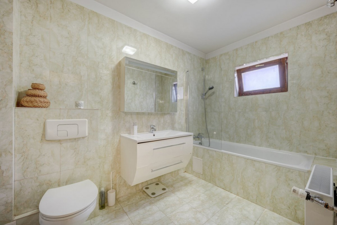Casă eficientă, cu garaj, într-un complex liniștit – poziție excelentă