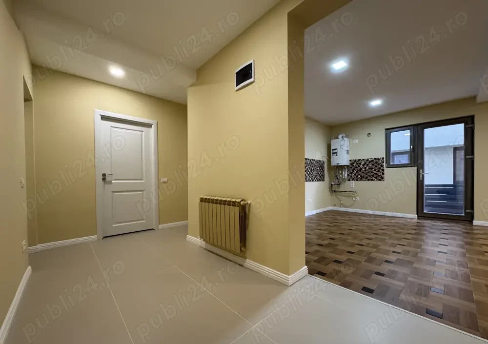 Apartament Nou cu 2 Camere Decomandat, Curte Proprie și Loc de Parcare
