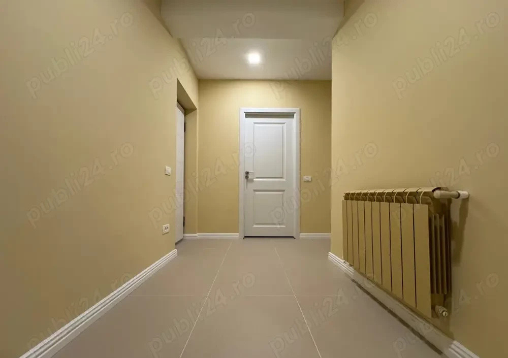 Apartament Nou cu 2 Camere Decomandat, Curte Proprie și Loc de Parcare